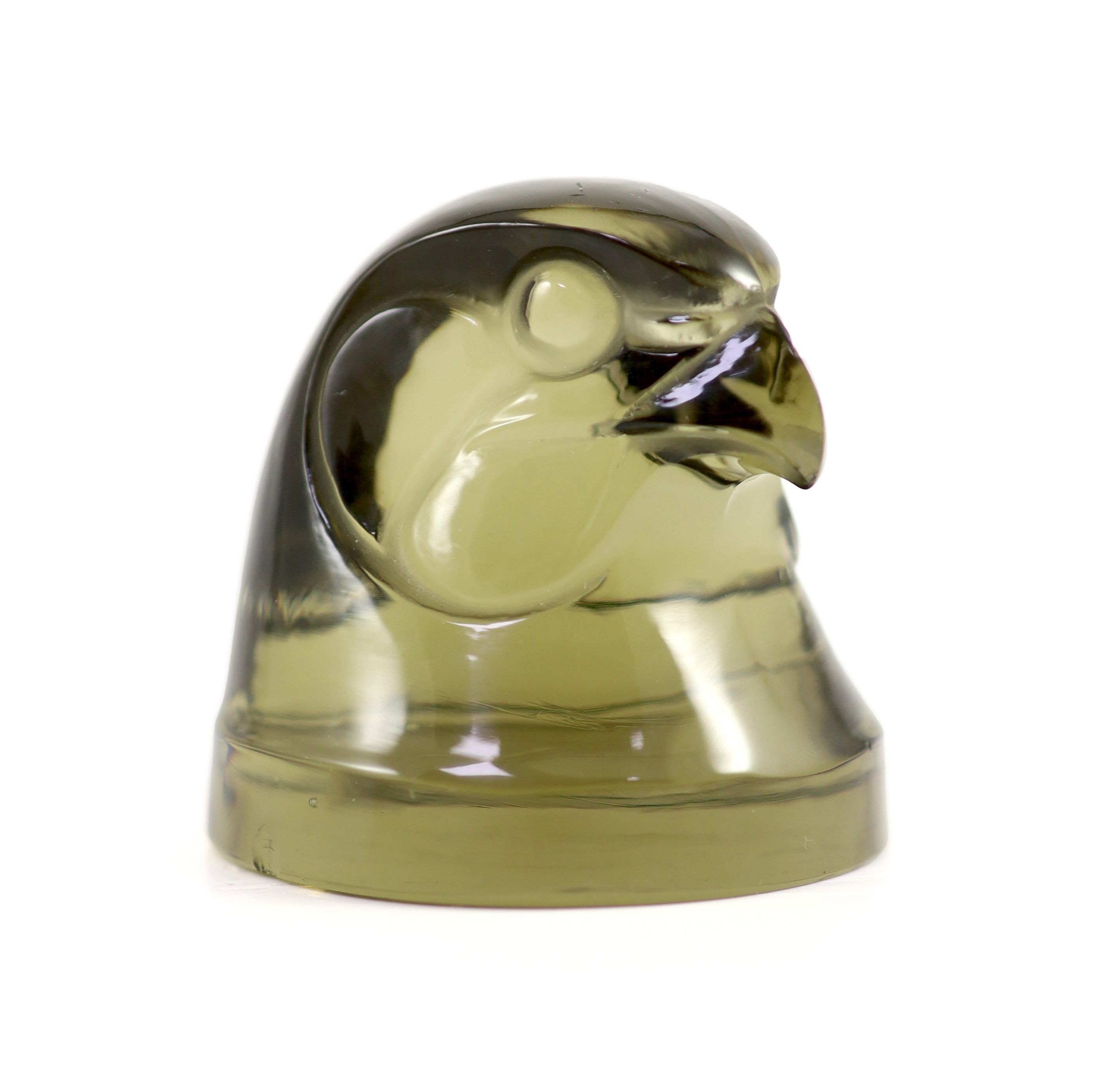 A Lalique 'Tete D'Epervier' topaz glass car mascot, 6.5 cm high